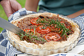 Quiche with tomato and rosemary