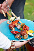 Vegetable skewers on a plate