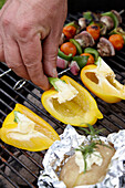 Yellow peppers on grill