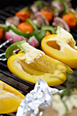 Yellow peppers on grill