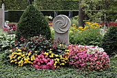 Gravesite with ice begonias