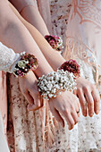 Floral jewellery on the wrist