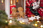 Gingerbread people with Christmas tablecloths