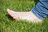 Foot on grass