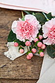 Cut flowers on a wooden background