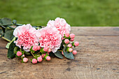 Cut flowers on a wooden background