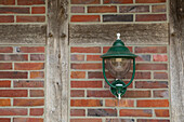 Lamp on house wall