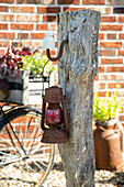 Rickel stake with lantern in rust finish