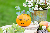 Autumn decoration - painted pumpkin