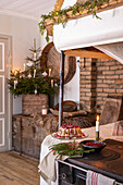 Kitchen decorated for Christmas with Gugelhupf and fresh cranberries