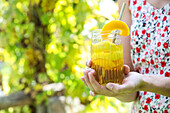 Citrus fruit tea with lemon balm