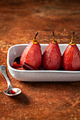 Pears in red wine with cinnamon