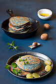 Pancakes with purple carrots, rosemary and nutmeg