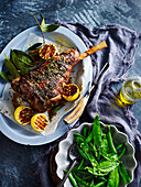 Spanish-style leg of lamb with lemons and snow peas