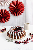 Chocolate cake with icing and cranberries