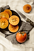 Persimmons whole and sliced