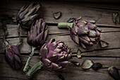 Artichokes on a wooden background