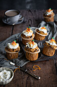 Carrot cake muffins with cream cheese icing