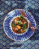 Vegetable curry with cashews and coriander greens