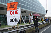 Extinction Rebellion climate activists gather to block the main highway A10 in front of the former headquarters of Dutch multinational bank on December 30, 2023 in Amsterdam,Netherlands. Environmental protectors of Extinction Rebellion make a demonstration against ING bank to protest its financing of fossil fuels.