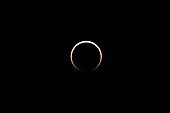 The moon moves across the front of the sun after the peak of the annular solar eclipse on 14 November 2023. Utah, USA. Two minutes and 30 seconds after peak annularity.