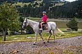 Horse riding in Vall de Nuria Sanctuary in the catalan pyrenees, Spain