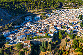 Aerial view of traditional white houses in Grazalema town, Cadiz Sierra de Grazalema Andalucia Spain.