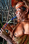 Flute music of Yagua Indians living a traditional life near the Amazonian city of Iquitos, Peru.