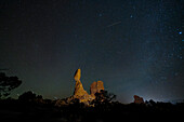 Geminid Meteor Shower over Balanced Rock in Arches National Park in Utah. Composite image shows 10 meteorites over a 2-hour period.