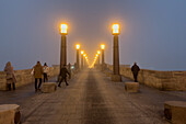 Foggy winter cityscape as temperatures go down in Zaragoza, Spain