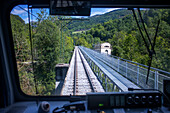 Cogwheel railway Cremallera de Núria train in the Vall de Núria valley, Pyrenees, northern Catalonia, Spain, Europe