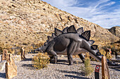 Large model of a stegosaurus dinosaur in front of the visitors center in Dinosaur National Monument near Jensen, Utah.