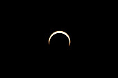 The moon moves across the front of the sun after the peak of the annular solar eclipse on 14 November 2023. Utah, USA. Seven minutes after peak annularity.