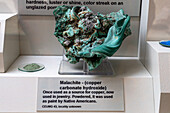 Malachite, copper carbonate hydroxide, in the mineral collection in the USU Eastern Prehistoric Museum, Price, Utah.