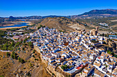 Aerial view of Iznajar village town reservoir and cemetry in Cordoba province, Andalusia, southern Spain.