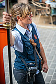 Staff of the vintage tram at Port de Soller village. The tram operates a 5kms service from the railway station in the Soller village to the Puerto de Soller, Soller Majorca, Balearic Islands, Spain, Mediterranean, Europe.