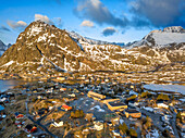 Aerial view landscape and beautiful panoramic view over Sørvågvatnet lake and fishing village Sørvågen located on coast of Norwegian Sea on Moskenesøy island, Lofoten, Norway.