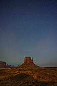 Stars over West Mitten Butte in Monument Valley Navajo Tribal Park, Arizona.