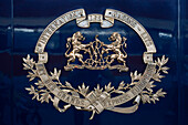 Sign trade brand of Belmond Venice Simplon Orient Express luxury train stoped at Venezia Santa Lucia railway station the central railway station in Venice Italy.