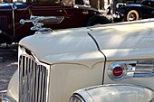 Detail of the front of a Packard classic car in a car festival in San Lorenzo de El Escorial, Madrid.