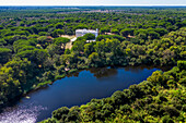 Aerial view of Palace of Acebron and lagoon in Doñana National Park, El Rocío, Huelva, Andalusia, Spain.