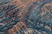 Multi-colored striped bentonite clay hills by the Fantasy Canyon Recreation Site in Utah.