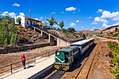 Old touristic train used for tourist trip through the Rio Tinto mining area, Huelva province, Spain.