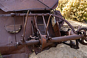 Mechanical detail of a vintage Deering New Ideal grain binding machine at Cottonwood Glen in Nine Mile Canyon, Utah.