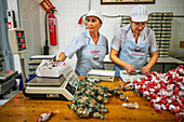 La Colchona in Estepa Andalusia, Spain Artisan shop of handmade Mantecados y Polvorones, Spanish Christmas sweet made from flour and almonds.