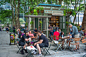 Bryant Park, read corner, bars and restaurants, Midtown Manhattan, New York City, USA.