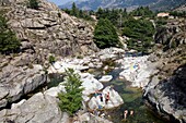 France, Haute Corse, Albertacce, swimming in the Golo river