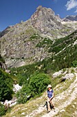 France, Isere, Valjouffrey, Ecrins National Park, Female hiker in the Font Turbat valley