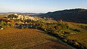 France, Vaucluse, regional natural park of Luberon, Ansouis, labelized The Most Beautiful Villages of France (aerial view)