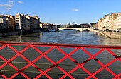 France, Rhone, Lyon, 2nd district, Bellecour district, historical site listed as World Heritage by UNESCO, Saint Georges footbridge on La Saône, the Bonaparte bridge in the background